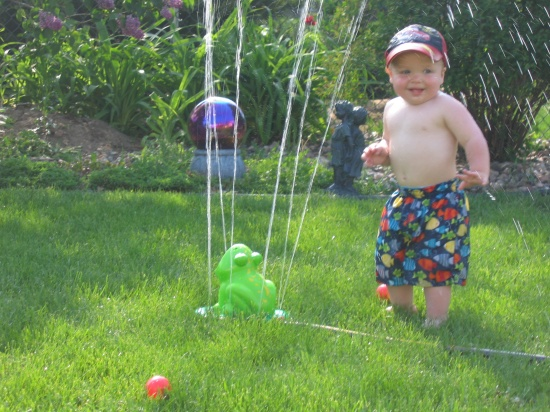 Kids With Sprinkler