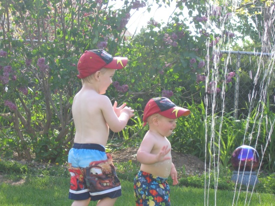 Kids With Sprinkler